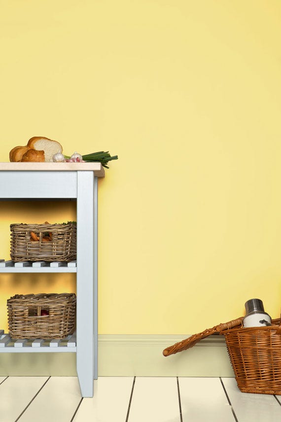 Hound Lemon No.2 by Farrow & Ball on a painted wall in a room setting
