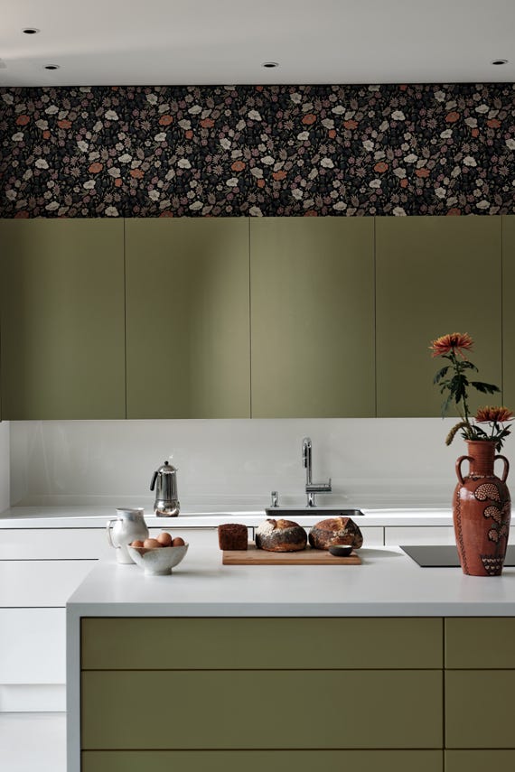 Olive No.13 by Farrow & Ball on a painted wall in a room setting