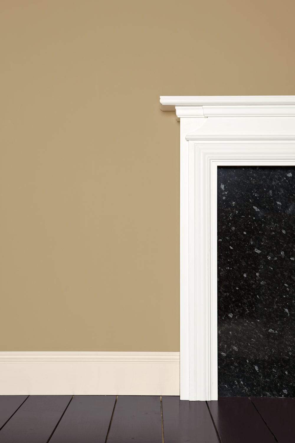 Buff No.20 by Farrow & Ball on a painted wall in a room setting