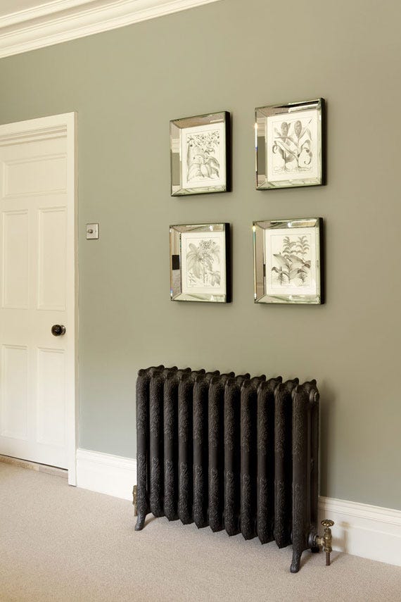 Pigeon No.25 by Farrow & Ball on a painted wall in a room setting