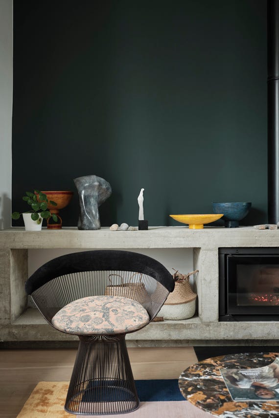 Chine Green No.35 by Farrow & Ball on a painted wall in a room setting