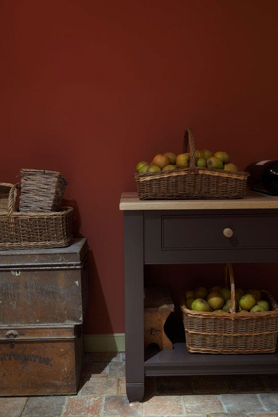Picture Gallery Red No.42 by Farrow & Ball on a painted wall in a room setting