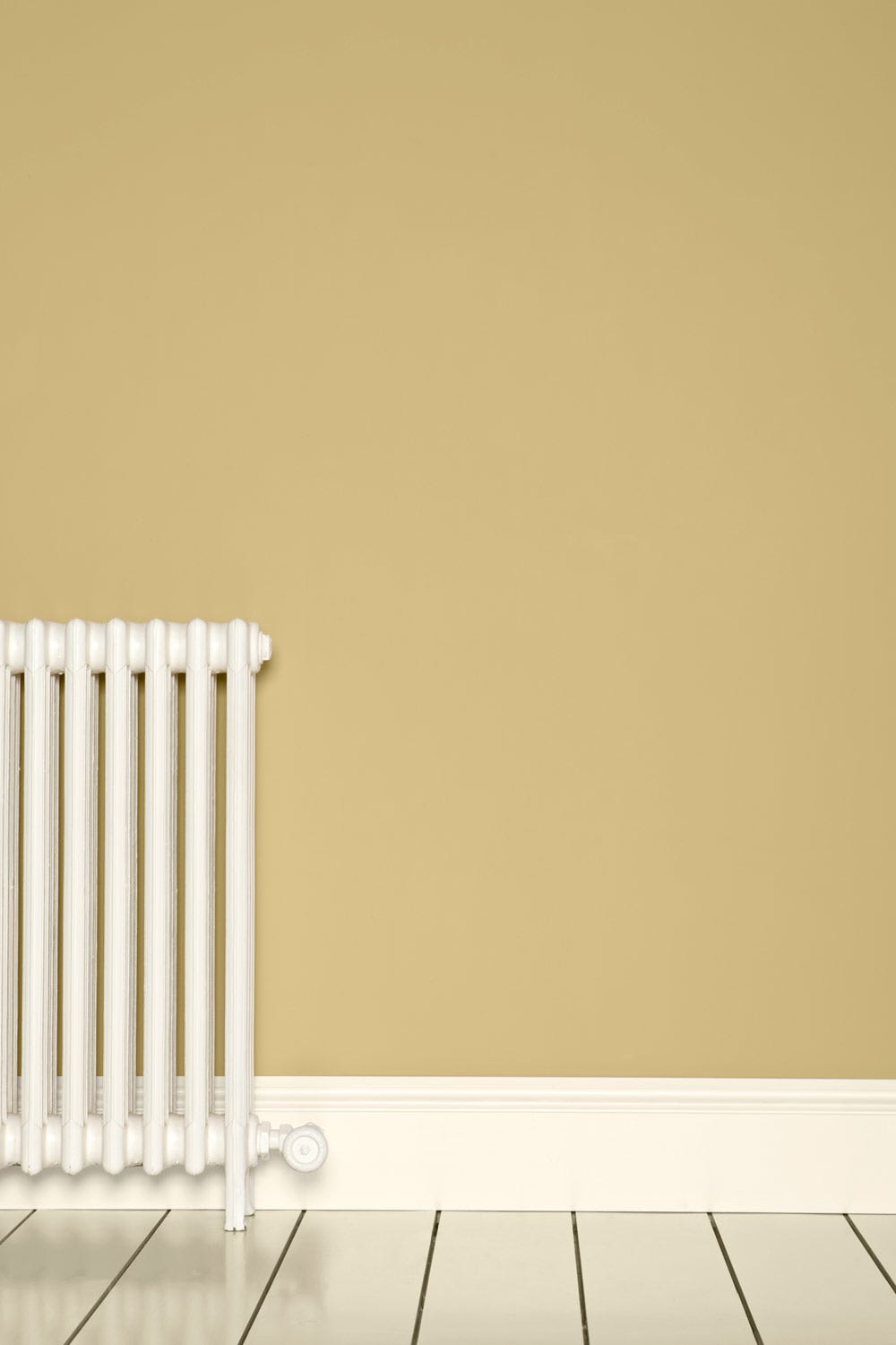 Cream No.44 by Farrow & Ball on a painted wall in a room setting