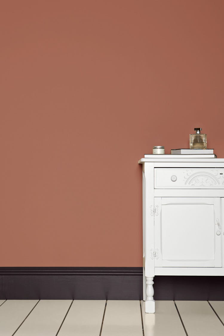 Porphyry Pink No.49 by Farrow & Ball on a painted wall in a room setting