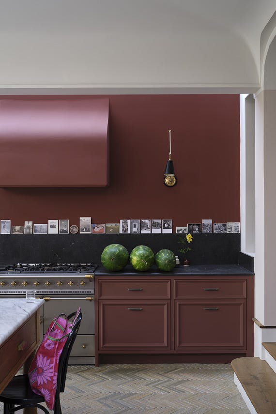 Etruscan Red No.56 by Farrow & Ball on a painted wall in a room setting