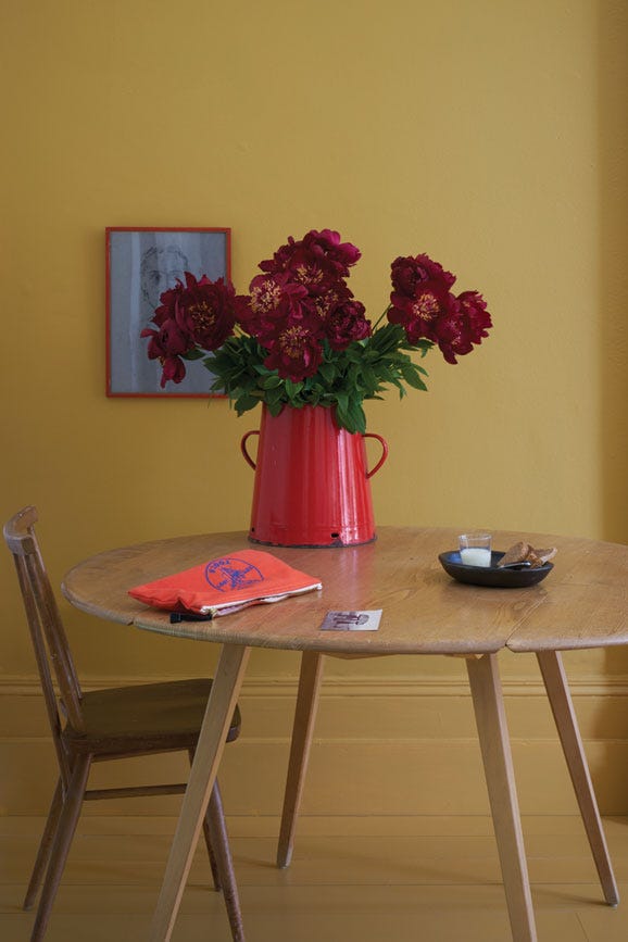 India Yellow No.66 by Farrow & Ball on a painted wall in a room setting
