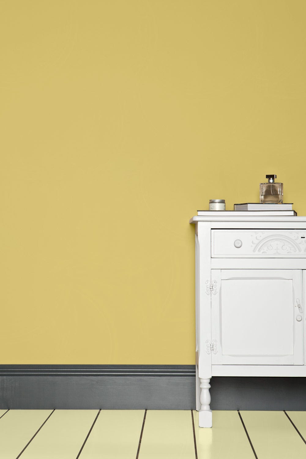 Gervase Yellow No.72 by Farrow & Ball on a painted wall in a room setting