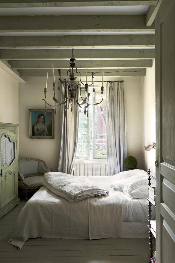 Ball Green No.75 by Farrow & Ball on a painted wall in a room setting