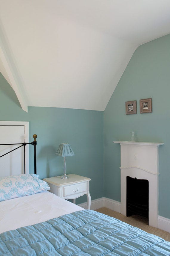 Green Blue No.84 by Farrow & Ball on a painted wall in a room setting