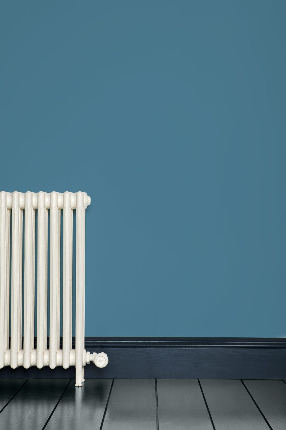 Chinese Blue No.90 by Farrow & Ball on a painted wall in a room setting