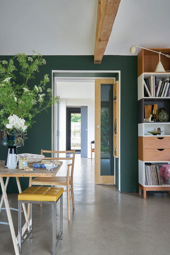 Studio Green No.93 by Farrow & Ball on a painted wall in a room setting