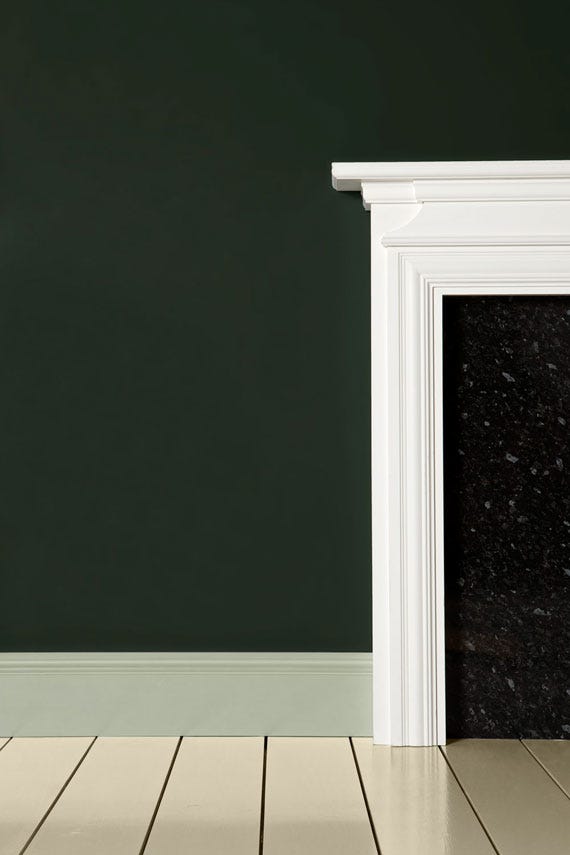 Carriage Green No.94 by Farrow & Ball on a painted wall in a room setting