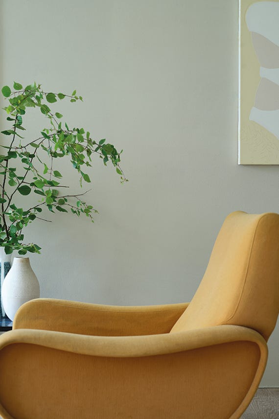 Skimmed Milk White No.W7 by Farrow & Ball on a painted wall in a room setting