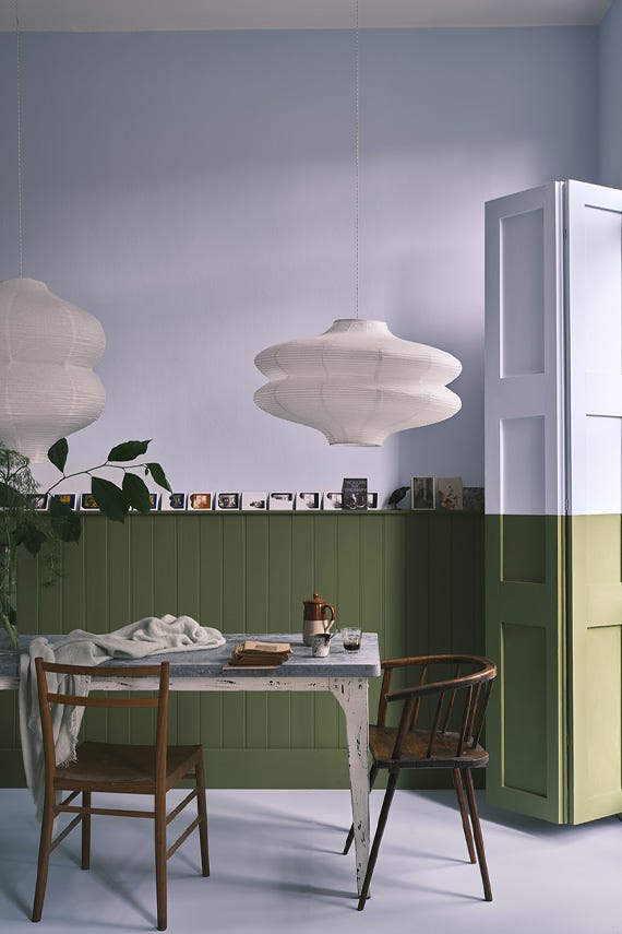 Sap Green No.199 by Farrow & Ball on a painted wall in a room setting