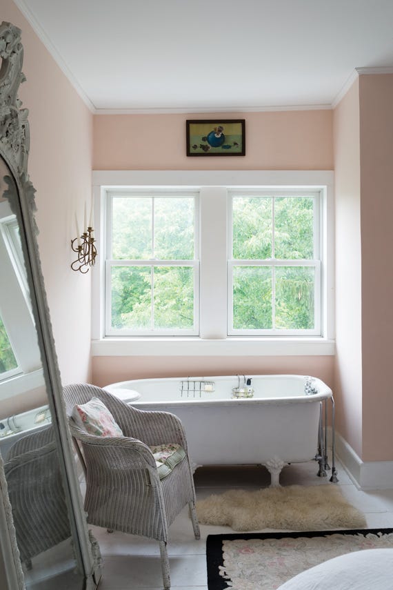 Pink Ground No.202 by Farrow & Ball on a painted wall in a room setting
