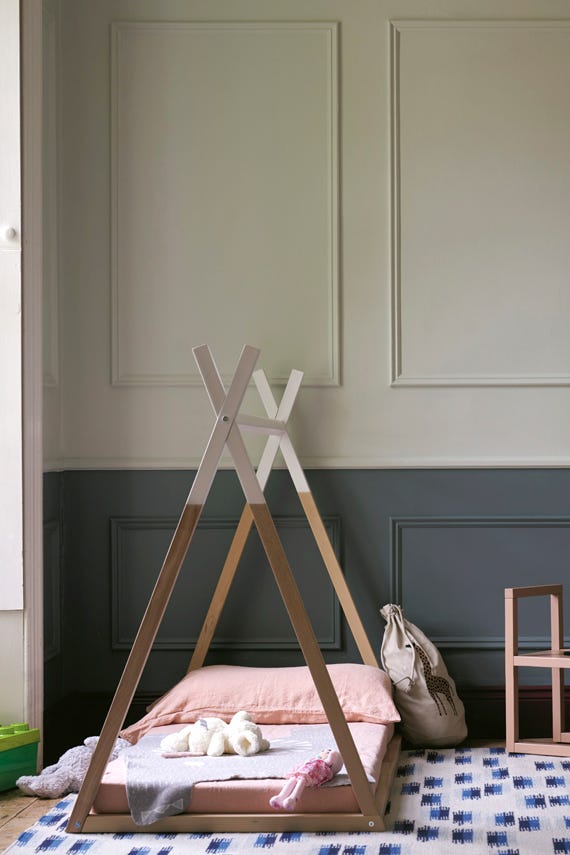 Pale Powder No.204 by Farrow & Ball on a painted wall in a room setting