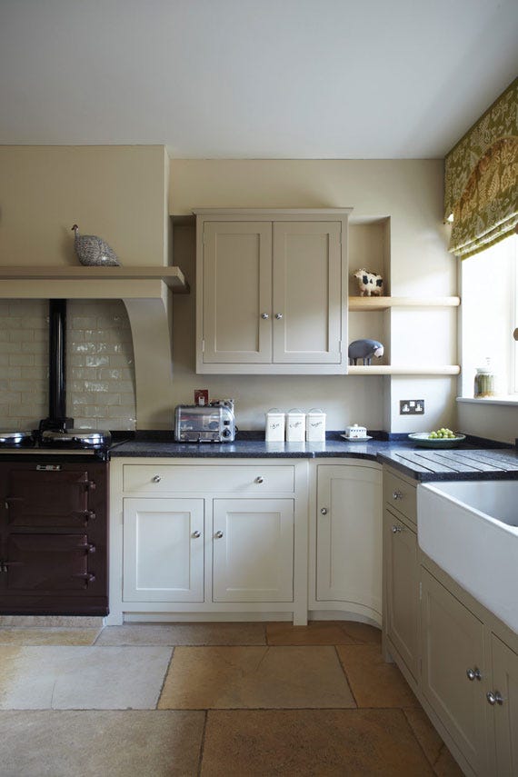 Savage Ground No.213 by Farrow & Ball on a painted wall in a room setting