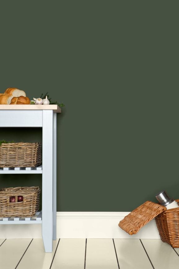 Minster Green No.224 by Farrow & Ball on a painted wall in a room setting