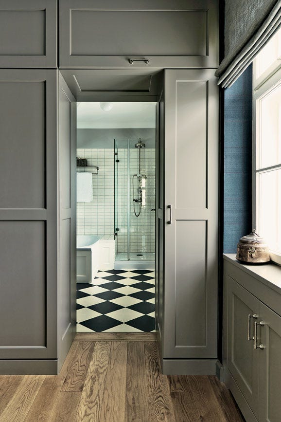 Charleston Gray No.243 by Farrow & Ball on a painted wall in a room setting