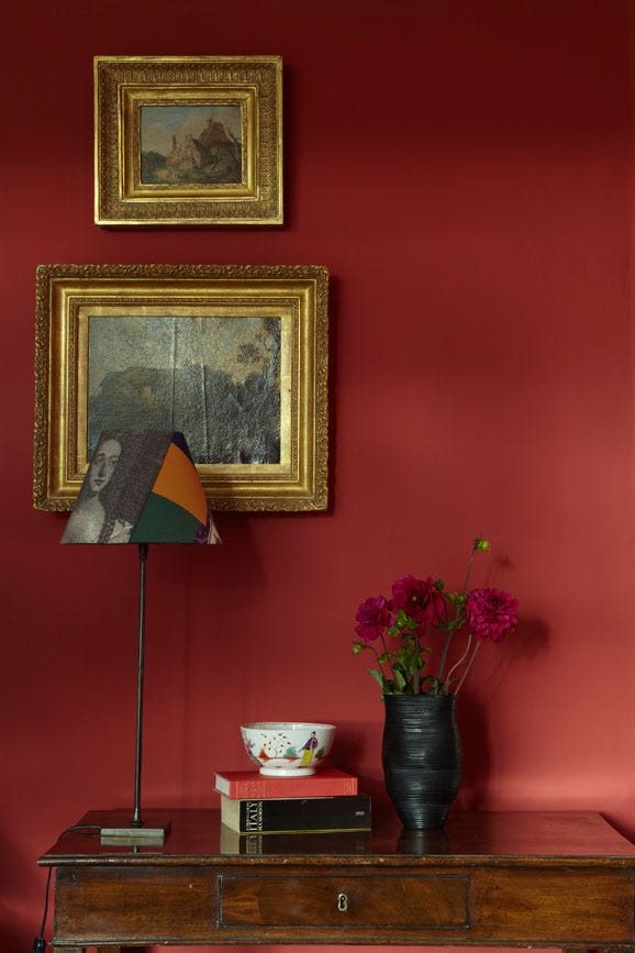 Incarnadine No.248 by Farrow & Ball on a painted wall in a room setting