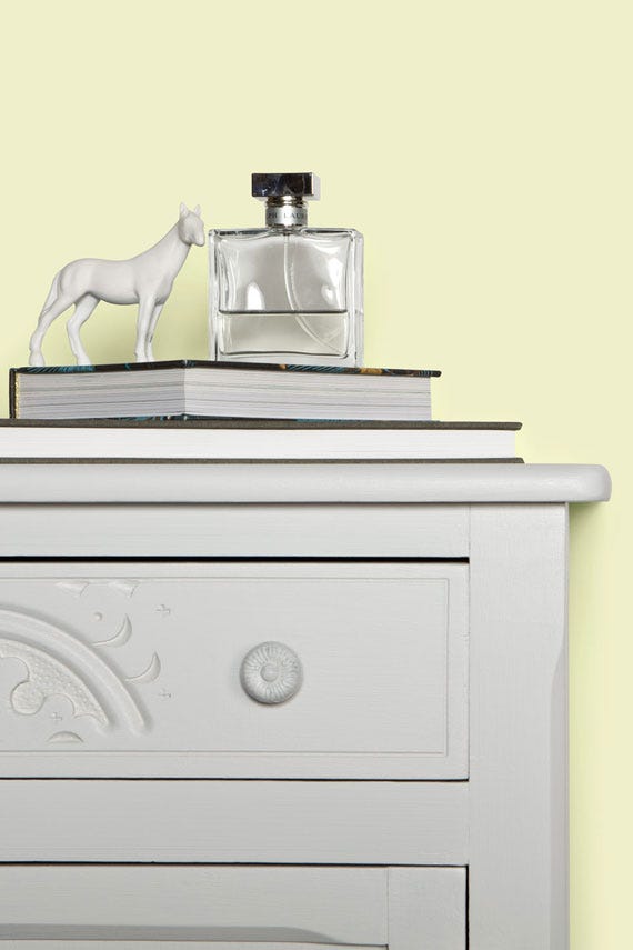 Tunsgate Green No.250 by Farrow & Ball on a painted wall in a room setting