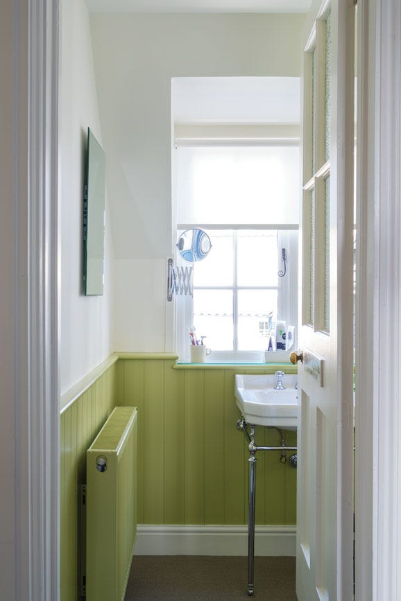 Churlish Green No.251 by Farrow & Ball on a painted wall in a room setting