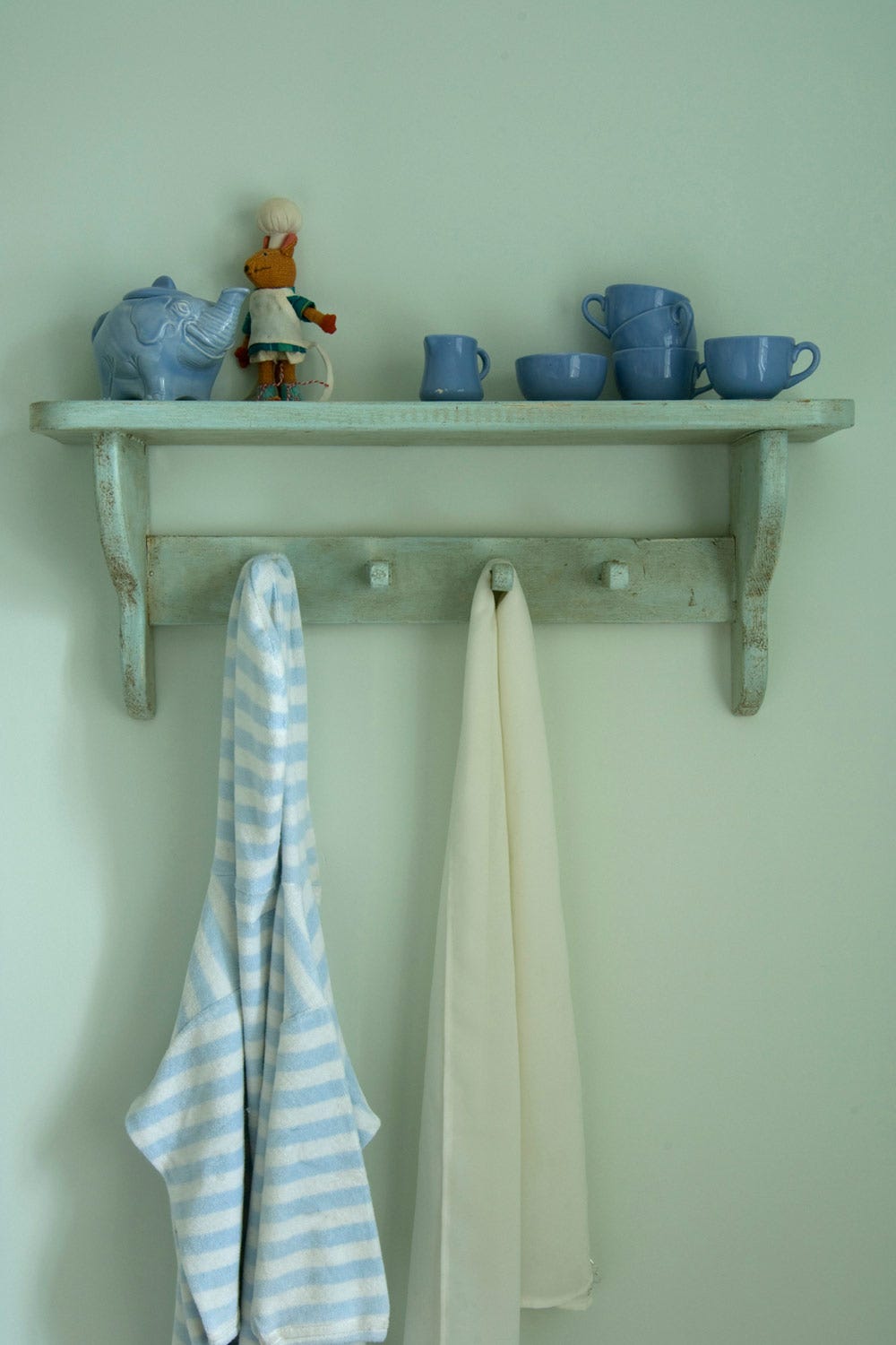 Pavilion Blue No.252 by Farrow & Ball on a painted wall in a room setting