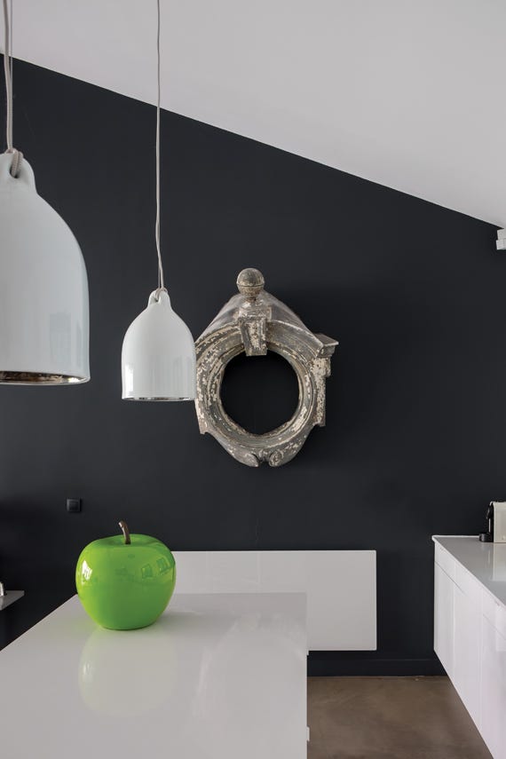Pitch Black No.256 by Farrow & Ball on a painted wall in a room setting