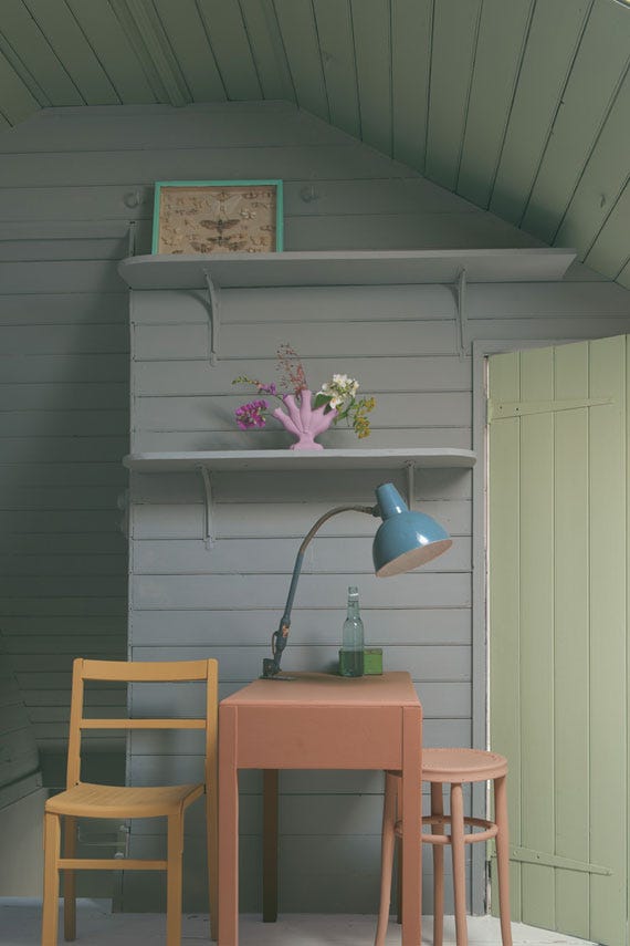 Manor House Gray No.265 by Farrow & Ball on a painted wall in a room setting