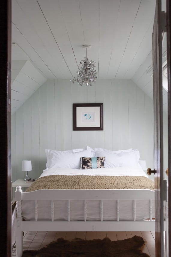 Cabbage White No.269 by Farrow & Ball on a painted wall in a room setting