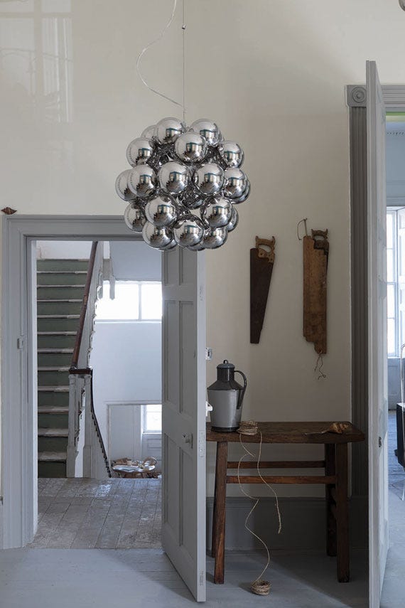 Shadow White No.282 by Farrow & Ball on a painted wall in a room setting