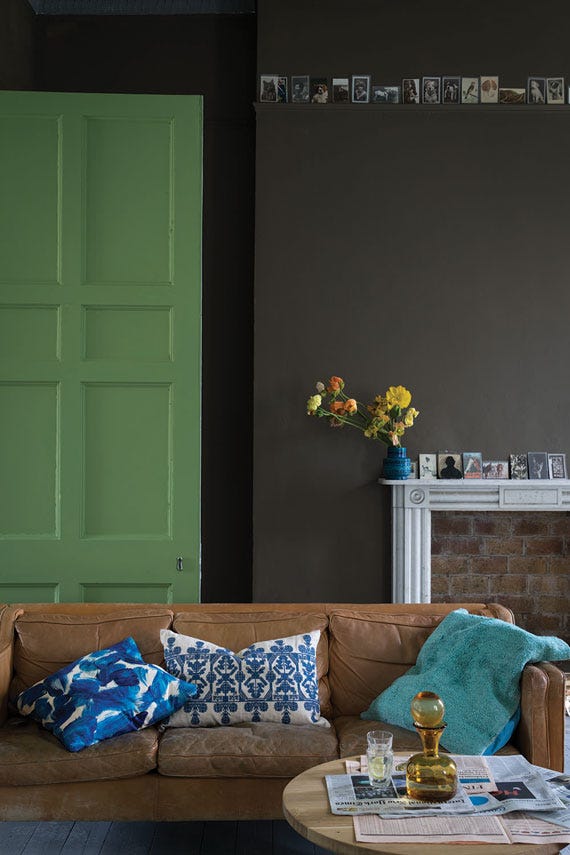 Salon Drab No.290 by Farrow & Ball on a painted wall in a room setting