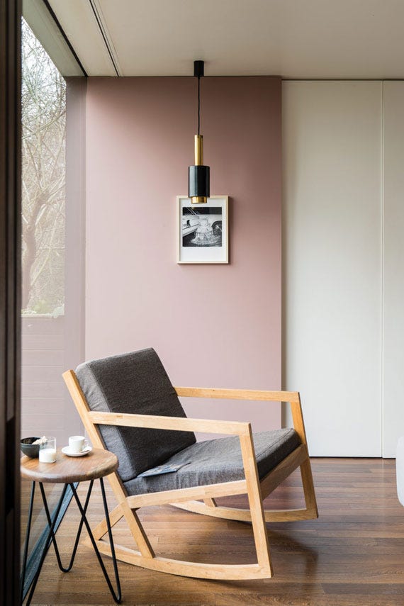 Sulking Room Pink No.295 by Farrow & Ball on a painted wall in a room setting