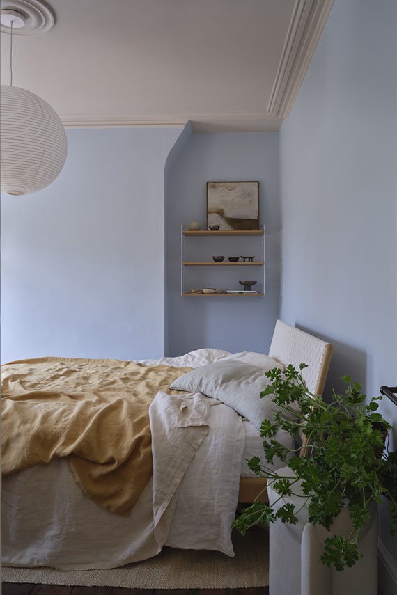 Kakelugn No.317 by Farrow & Ball on a painted wall in a room setting