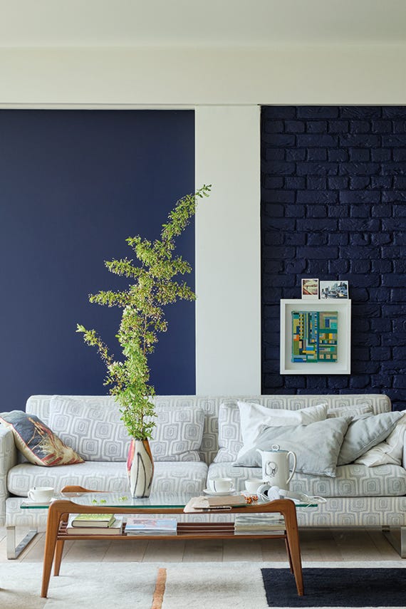 Titmouse Blue No.W24 by Farrow & Ball on a painted wall in a room setting