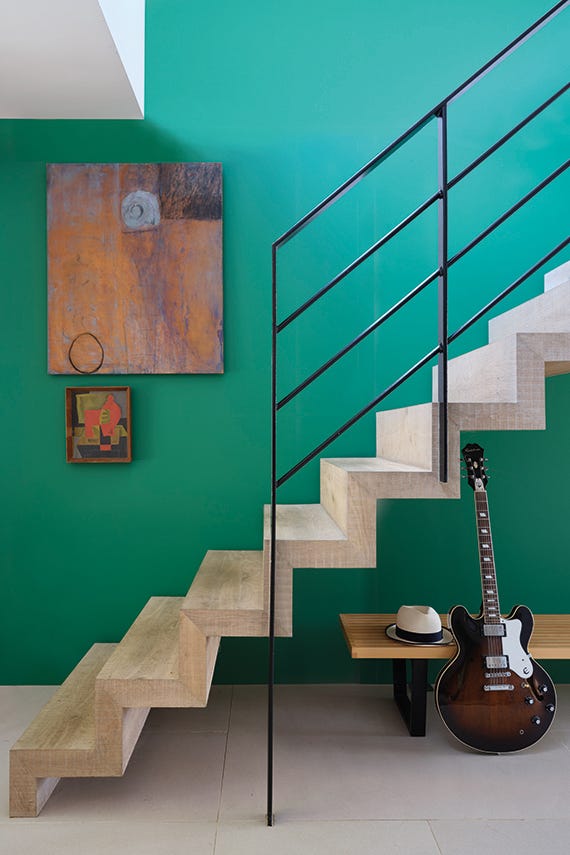 Verdigris Green No.W50 by Farrow & Ball on a painted wall in a room setting