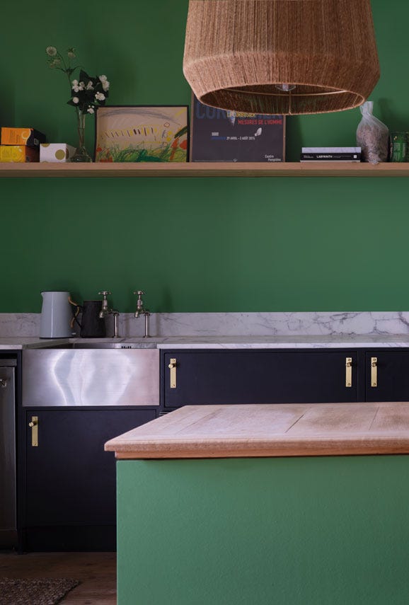 Emerald Green No.W53 by Farrow & Ball on a painted wall in a room setting