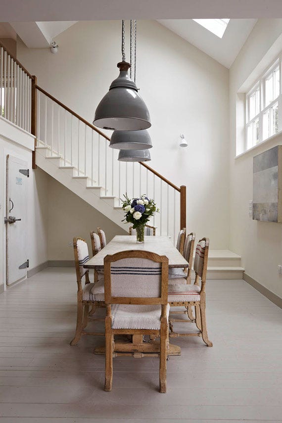 Slipper Satin No.2004 by Farrow & Ball on a painted wall in a room setting