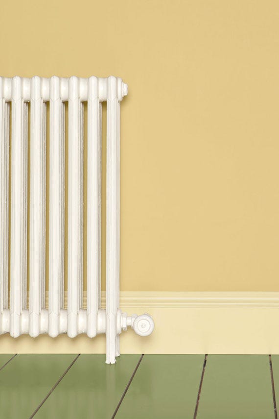 Double Cream No.9907 by Farrow & Ball on a painted wall in a room setting