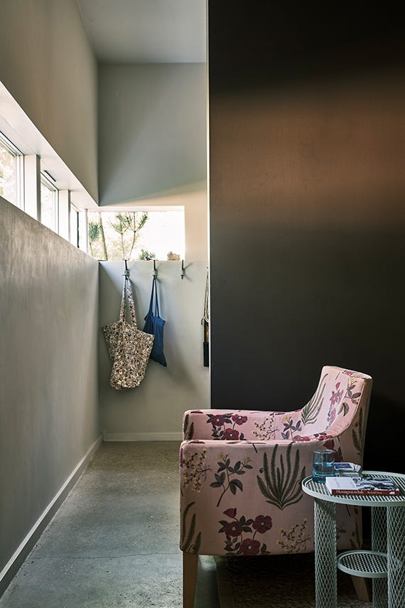 Cola No.9918 by Farrow & Ball on a painted wall in a room setting